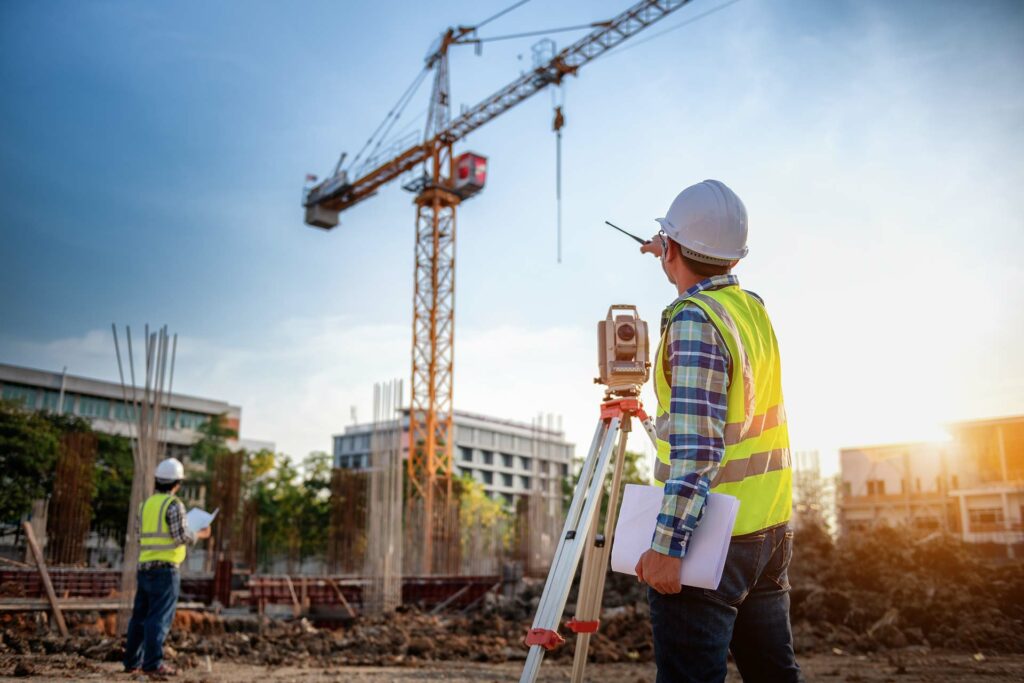 Construction worker watching a crane