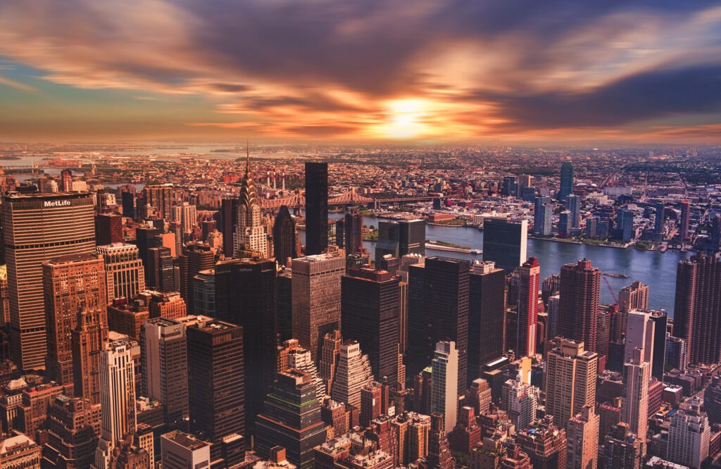 aerial view of Manhatten New York, Jersey City and Hudson River at sunset