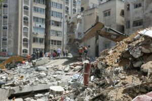 Saltus’ Construction Monitor team surveying a building demolition site, ensuring compliance with new NYC construction codes.